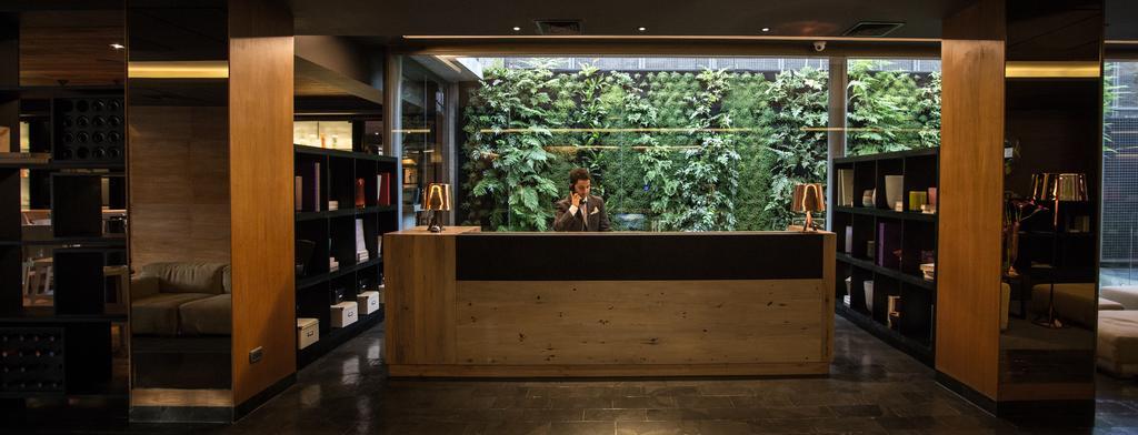 Solace Hotel Santiago Exterior photo Reception desk at the hotel