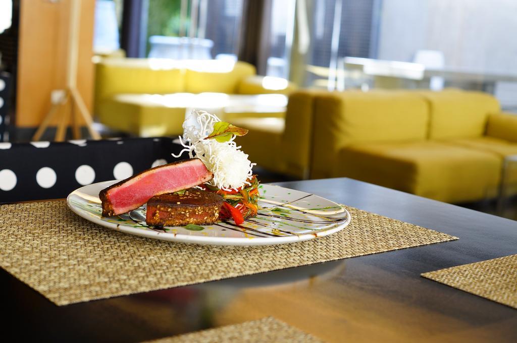 Solace Hotel Santiago Exterior photo A tuna steak