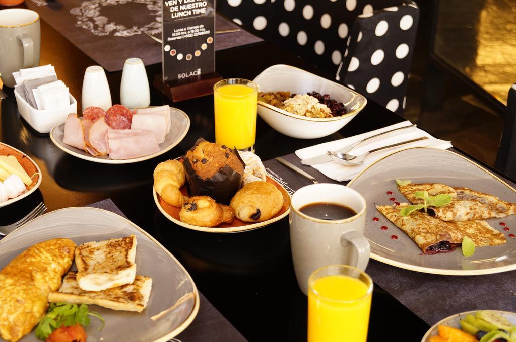 Solace Hotel Santiago Exterior photo A typical breakfast buffet